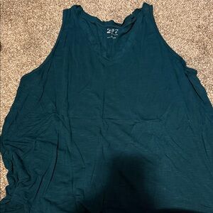 Maurice’s tank top.